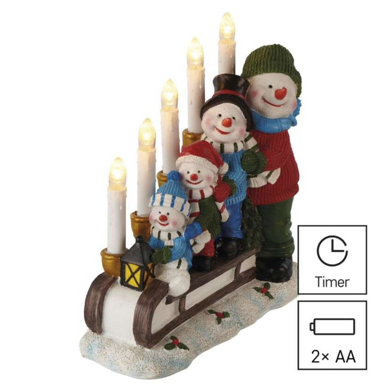 LED svietnik – snehuliaci na saniach, 24 cm, 2x AA, vnútorný, teplá biela, časovač 5